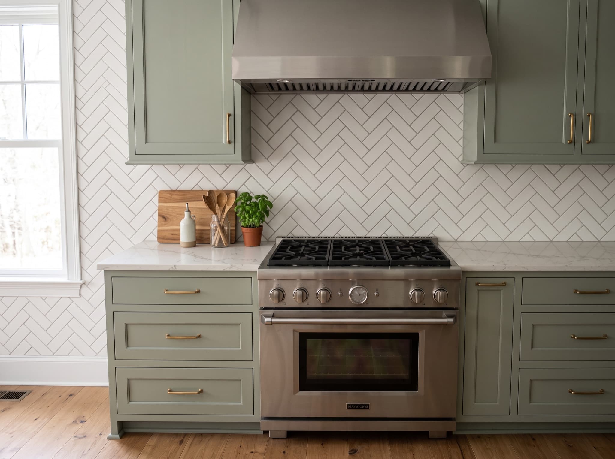 AI kitchen backsplash ideas with herringbone tile behind the range AI kitchen backsplash ideas with herringbone tile behind the range