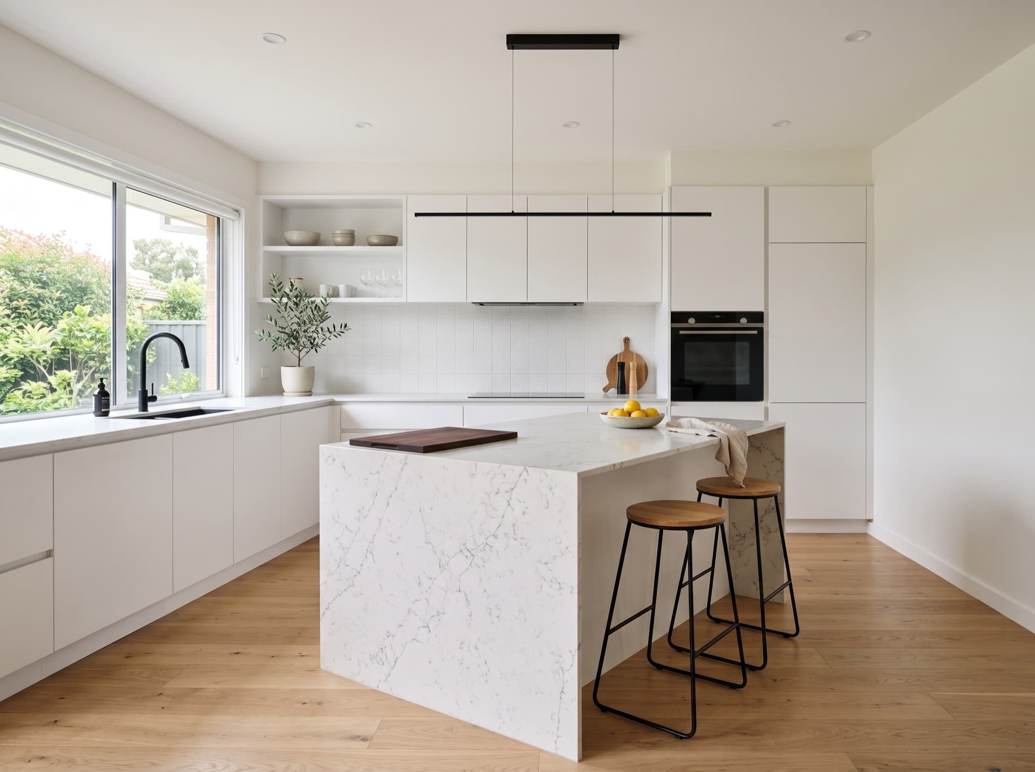 Modern AI kitchen design with handleless cabinets and a quartz waterfall island Modern AI kitchen design with handleless cabinets and a quartz waterfall island